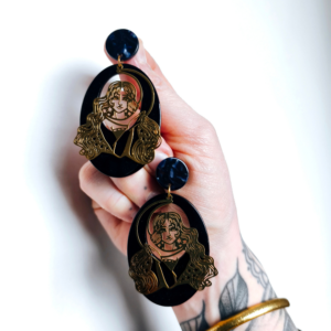 boucles oreilles feminin sacre