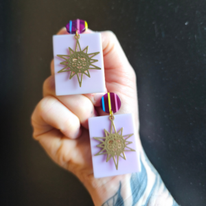 boucles oreilles soleil violet