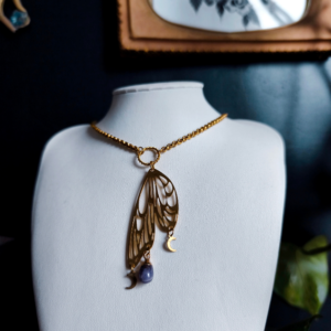 collier aile papillon magique